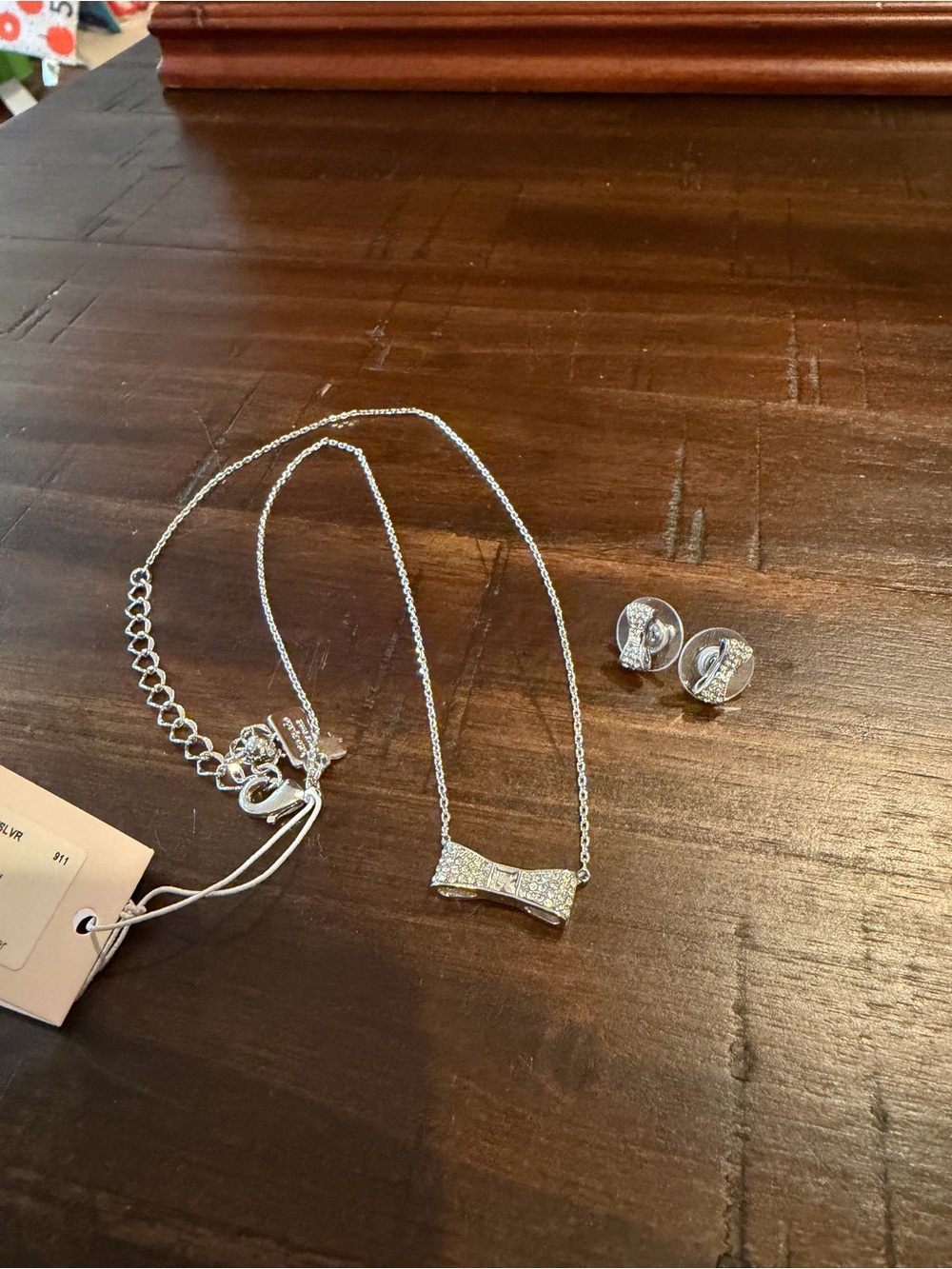Kate Spade Silver Bow Necklace with Matching Stud Earrings